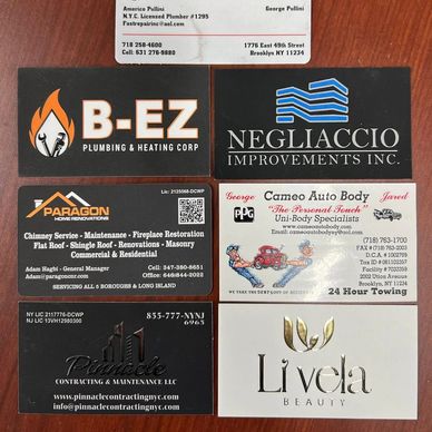Collection of custom business cards with matte, gloss, foil, and spot UV finishes.