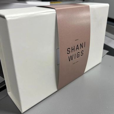 Luxury custom printed product packaging box with soft pink branded sleeve and clean premium retail p