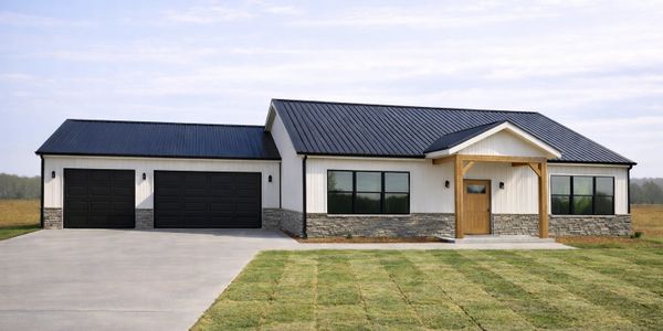 Modern single-story house with black roof and garage doors.