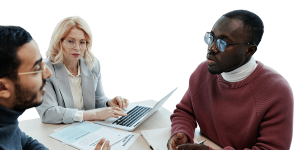 Man in a meeting with two consultants, one male and one female.
