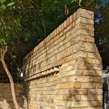 repointing brickwork
spalling brickwork repair
spalling brick repair
fill holes in brick
bricklayer