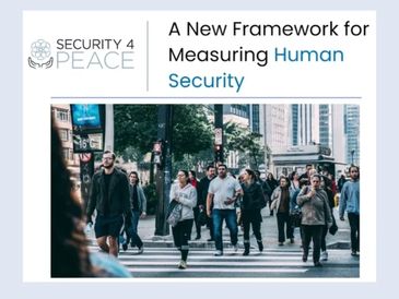 People walking on a city crosswalk, illustrating human security.