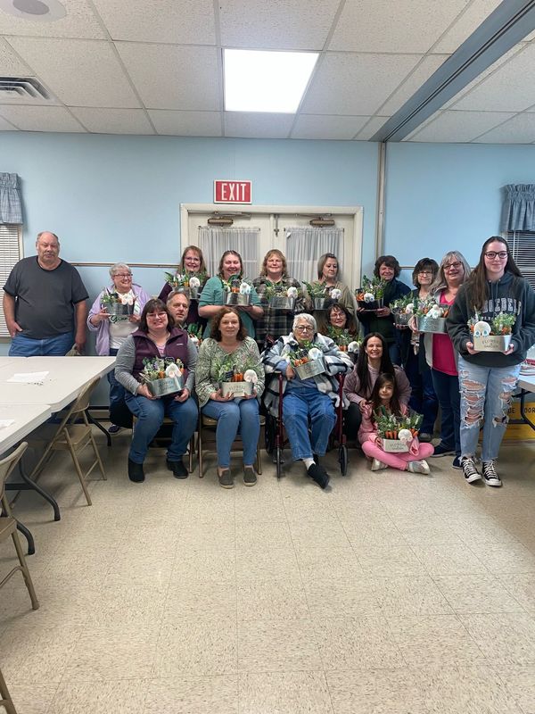 Group of ladies with the crafts they made