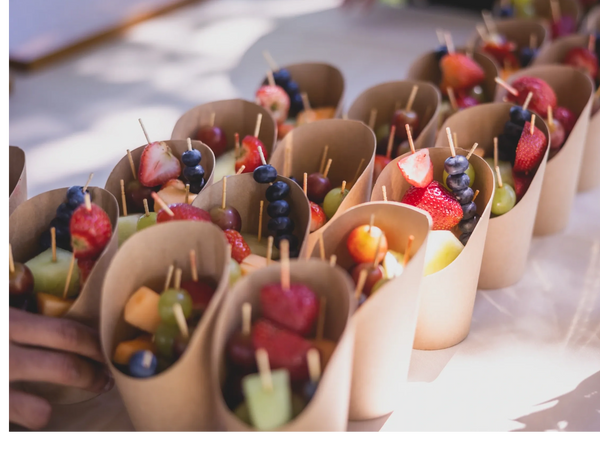 individual appetizer cups with fresh fruit skewers for cocktail wedding event