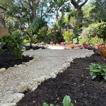 Shell pathway leading through garden