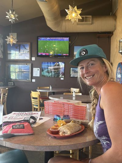 Kate enjoying her favorite burrito-Coconut Crunchy Tofu!