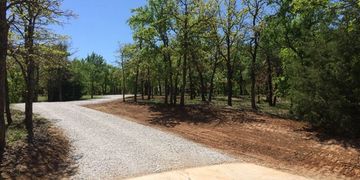 Tree removal, grading and gravel in Bartonville, Texas.