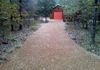 A Red River pea gravel driveway in Cross Roads, Texas.