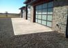 A new topping of crushed limestone for a parking area and gravel driveway in Sanger, Texas.