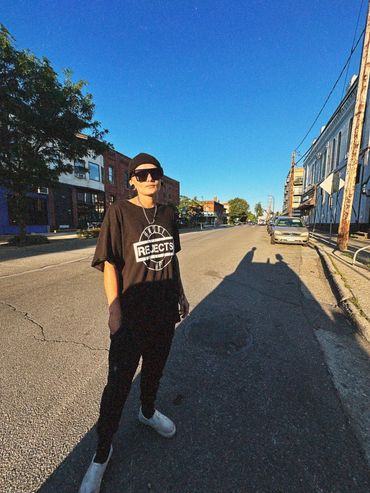 girl wearing house of rejects shirt outside. officialhor