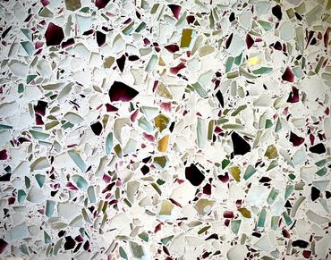 Close up image of Vetrazzo recycled glass countertop in Orchid Reflection.