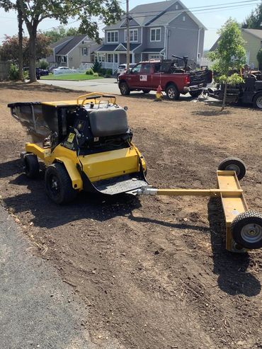 Our quad Aer 3000 Stinger Core Aerator pulling our kultipacker makes the perfect seedbed.