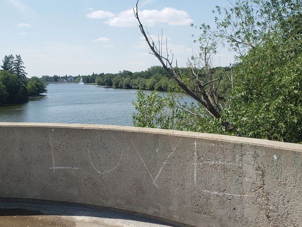 Love written on railing at Wascana Park in Regina, Saskatchewan