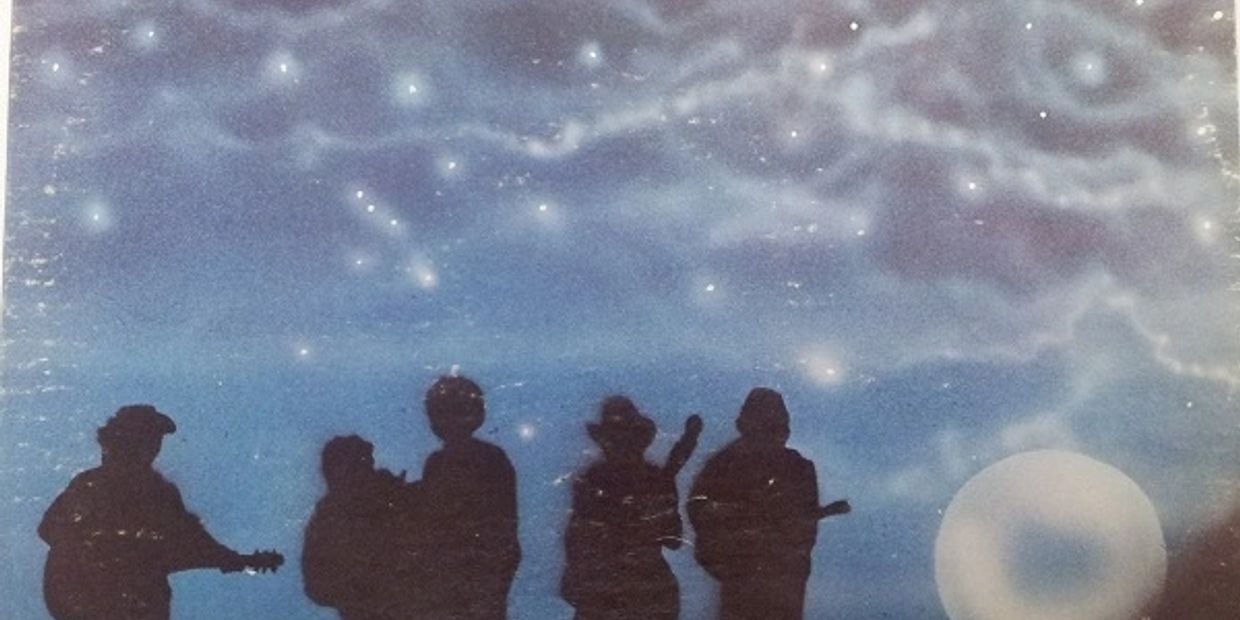 Still 'live & Pickin' LP cover.  Art by Phil Smith