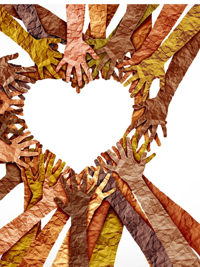 Diverse hands forming a heart shape symbolizing unity and love.