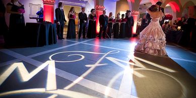 gobo projection wedding lighting event lighting monogram lighting initials on the dance floor 