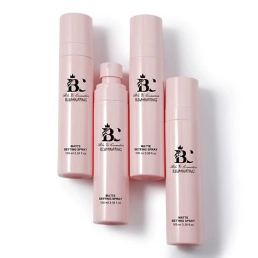 Four pink bottles of Ble Vi Cosmetics Matte Setting Spray arranged on white background.