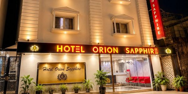 Exterior view of Hotel Orion Sapphire at night.