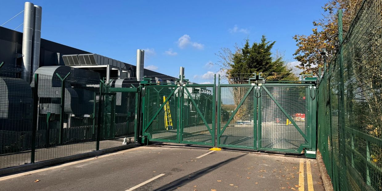 Bi-folding speed gates for security site with barb wire and gate automation