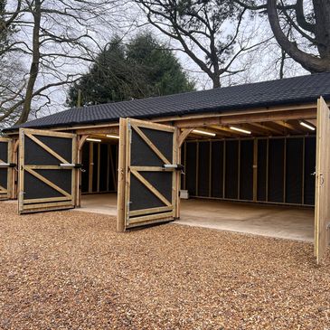 Garage doors with fully automated access and electric motor operation.