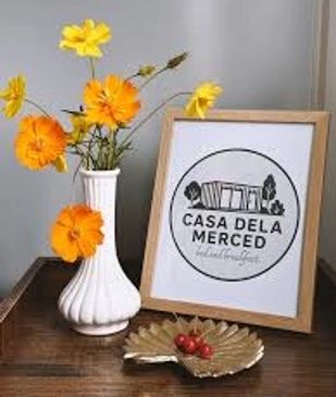 Welcome sign with flowers at Casa Dela Merced Bed and Breakfast, Dinagat Islands.