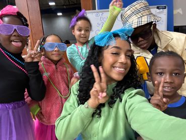 Educating visual arts children about the history of fashion styles.