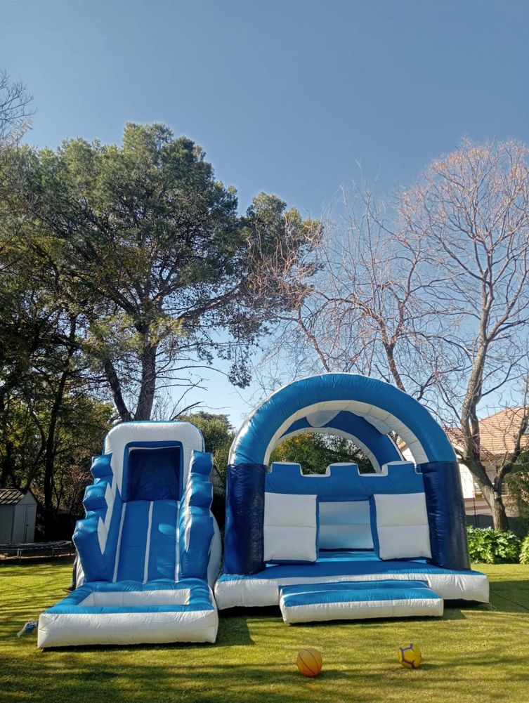 7mx5.5m jumping castle with roof and slide with pond. blue, white and dark blue jumping castle
