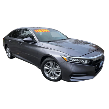 Gray sedan car with $15,500 price tag on windshield.