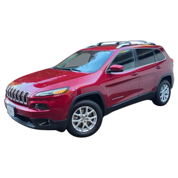 Red Jeep Cherokee SUV with roof rails and silver wheels.