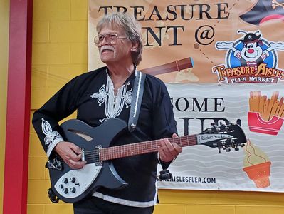 Singer/songwriter Gary David Reece performs live at Treasure Aisles.