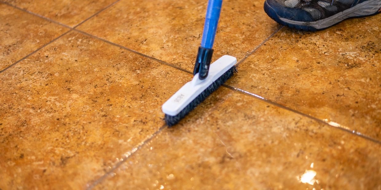 A picture of tiles cleaning with brush