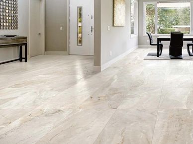 Large rectangular porcelain tile floors in entry and living room