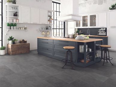 Dark gray 12x24 porcelain tile floor in kitchen