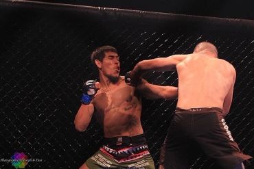 Left hook in mma fight by professor Stockton The Marine Gremlin taught by Allan Green
