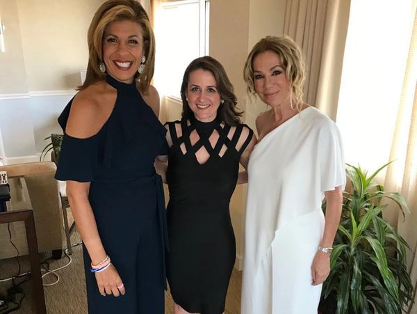 Hoda Kot, a woman in a black dress in the middle, Kathie Lee Gifford standing in a hotel room