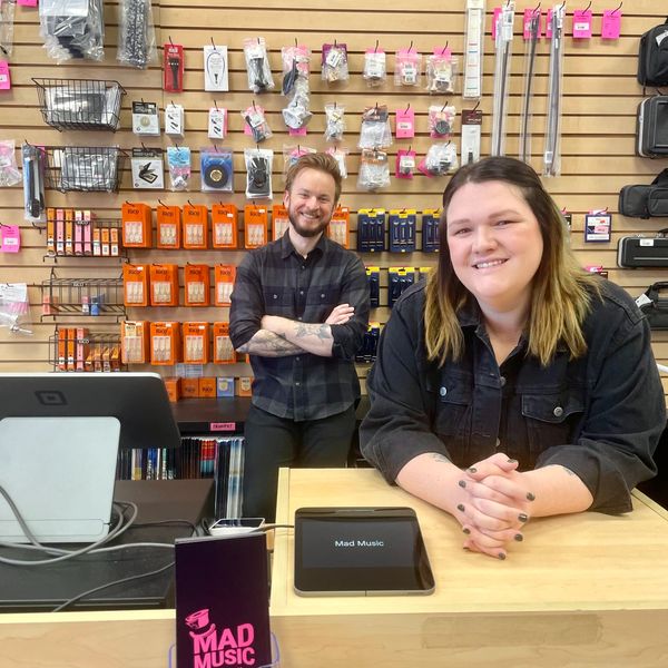 Owners, Michelle and Adam, standing in their store, Mad Music, in Chandler, Arizona.