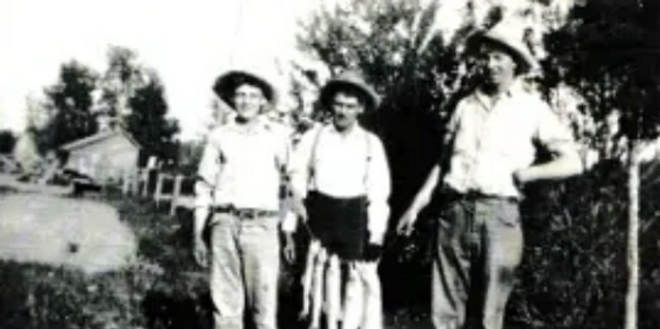 Some of Luca's family, including his great-great grandfather, pose with their catch after fishing.
