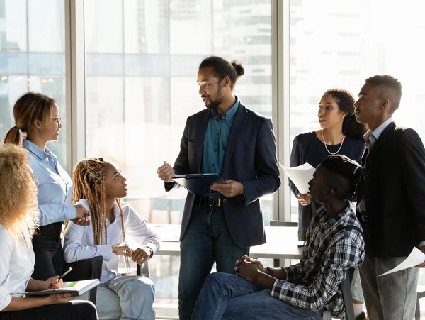 Startup marketing team gather for brainstorm about strategy,