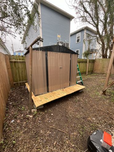 Outdoor metal Shed built on cinder blocks with a heavy duty plywood floor