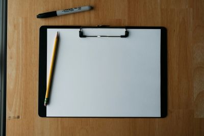 Clipboard and pencil