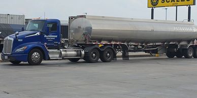 Semi truck with tanker trailer requires roadside assistance on-site at Loves truck stop in Natalia T
