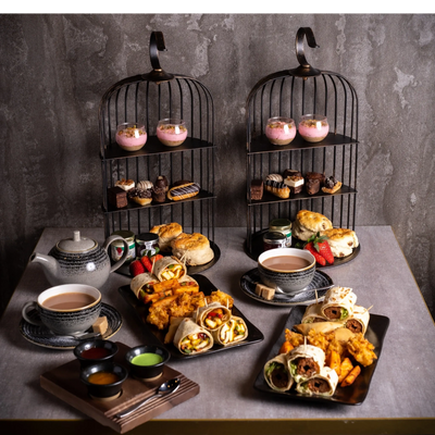 Two Trays and Biscuits With Tea Cups