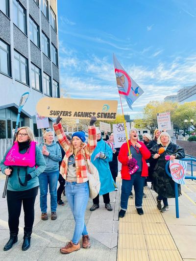 Group protesting against sewage pollution.
