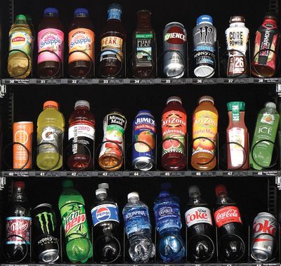 A drink vending machine with rows of drinks serving the Kalamazoo area.