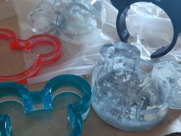 photo of well known mouse ears in resin of various colors