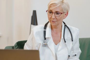Female doctor checking paperwork