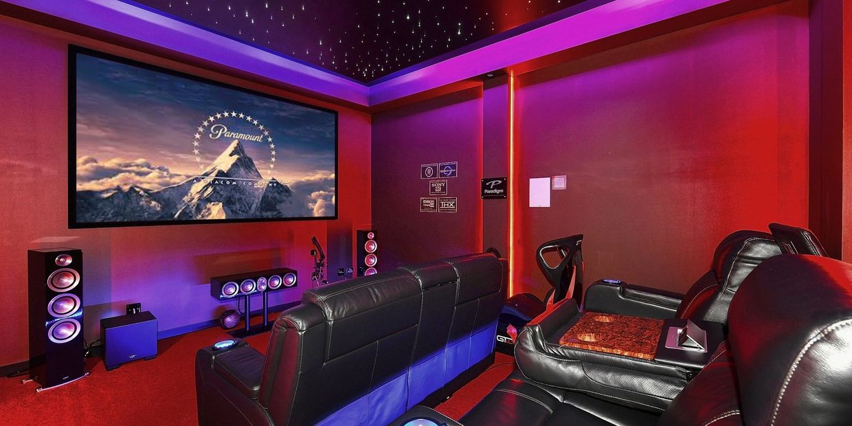 Finished home theatre in Kellyville by Excalibur Design: fibre-optic star ceiling, LED cove lighting