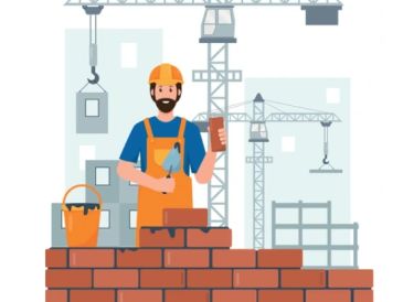 Construction worker laying bricks at a building site.