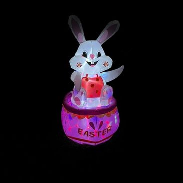 Illuminated Easter bunny decoration glowing in the dark.