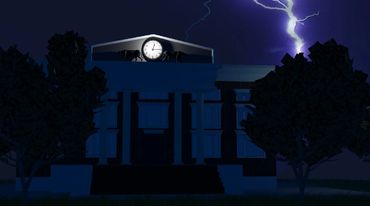 A courthouse from the outside during a lightning strike.